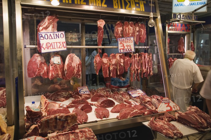 Athens, Attica, Greece. Central Market Display of meat on butchers stall in covered market. Greece Greek Europe European Vacation Holiday Holidays Travel Destination Tourism Ellas Hellenic Attica Athens Central Market Meat Beef Butcher Butchers Food Stall Shop Store Display Price Prices Vendor Vendor Atenas Athenes Color Destination Destinations Ellada Southern Europe