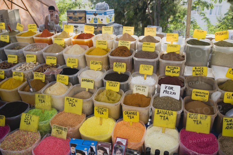 Kusadasi, Aydin Province, Turkey. Stall at weekly market selling spices and tea powders in brightly coloured display. Asian Colored Destination Destinations European Middle East South Eastern Europe Turkish Turkiye Western Asia
