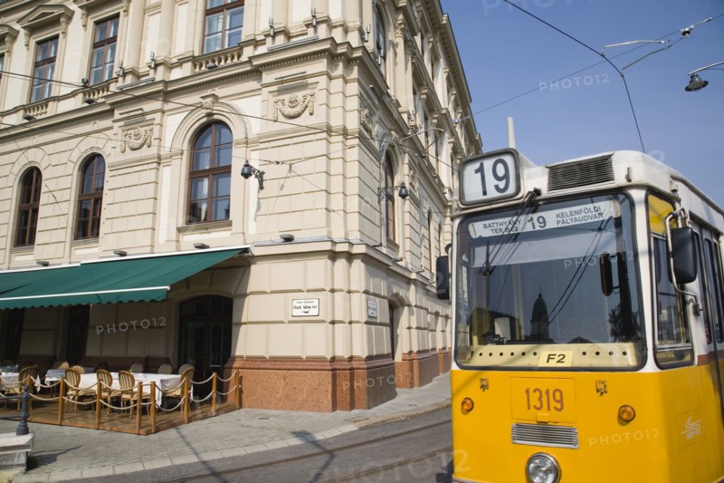 Budapest, Pest County, Hungary. Tram on bank of the River Danube Buda at approach to Chain Bridge. Hungary Hungarian Europe European East Eastern Buda Pest Budapest City Transport Tram Electric Electric Yellow Street Color Destination Destinations Eastern Europe