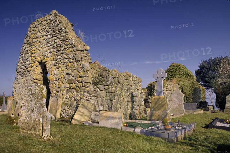 Ardboe, County Tyrone, Ireland. Abbey church ruins. Ireland Irish Eire Erin Europe European Ulster North Northern County Tyrone Ardboe Abbey Church Ruin Ruins Religion Religious Christian Christianity Architecture Stone Walls Blue Color Destination Destinations Gray History Historic Northern Europe Poblacht na hEireann Religion Religious Christianity Christians Republic Colour Grey