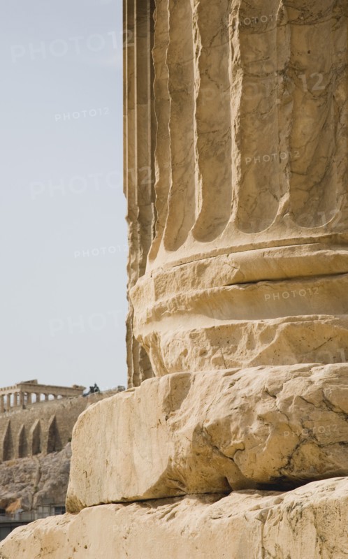 Athens, Attica, Greece. Base of ruined column on The Temple of Olympian Zeus with Parthenon and Acropolis behind. Greece Greek Attica Athens Europe European Vacation Holiday Holidays Travel Destination Tourism Ellas Hellenic Acropolis Parthenon Temple Olympian Zeus Ruin Ruins Column Columns Atenas Athenes Destination Destinations Ellada History Historic Southern Europe