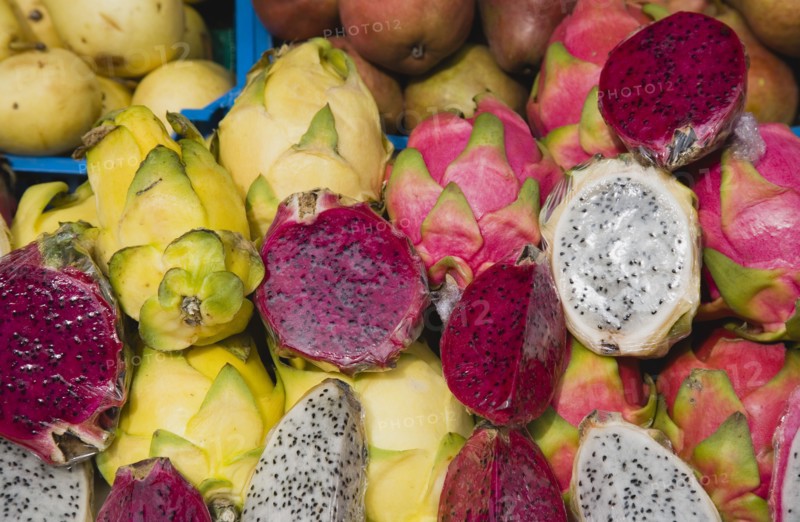 Vienna, Austria. The Naschmarkt. Exotic fruit for sale on market stall. Genus Hylocereus sweet pitayas commonly known as dragon fruit. Austria Austrian Republic Vienna Viennese Wien Europe European City Capital Naschmarkt Market Display Fresh Food Fruit Stall Shop Store Dragon Color Destination Destinations Osterreich Viena Western Europe