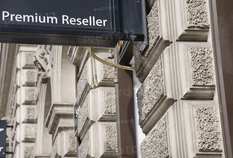 Vienna, Austria. Business sign on building facade reads Premium Reseller. Austria Austrian Republic Vienna Viennese Wien Europe European City Capital Business Sign Signs Architecture Facade Exterior Premium Reseller Destination Destinations Osterreich Signs Display Posted Signage Viena Western Europe