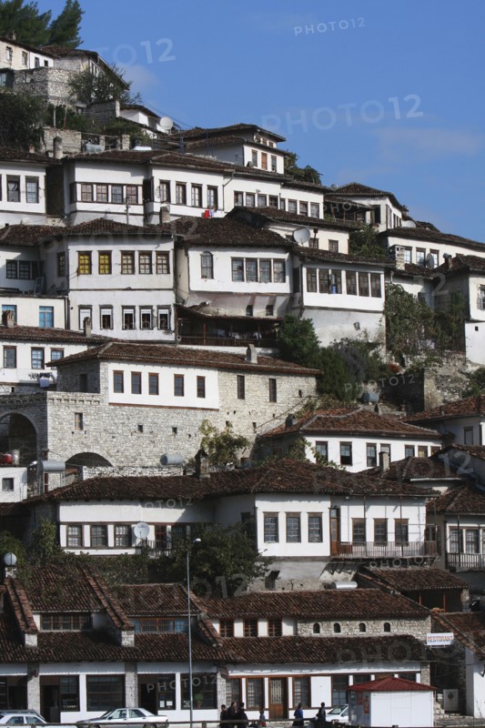 Berat, Albania. Houses built on hillside on the banks of the River Osum. Albanian Shqip‘ria Southern Europe Albania Albanian Republic Europe European Travel Destination Indo European Berat River Osum Banks Hillside Architecture Houses Housing Urban Water Home Blue Destination Destinations