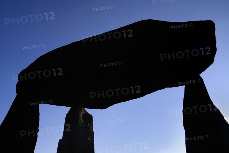 Legananny, County Down, Ireland. Mourne Foothills Legananny Dolmen feature of the Neolithic Age 5000 years ago. Ireland Irish Eire Erin Europe European Ulster North Northern County Down Mourne District Legananny Domen Neolithic Stone Blue Sky Silhouette Silhouetted Color Destination Destinations History Historic Northern Europe Poblacht na hEireann Religion Republic Solid Outline Shade Silhouette Solid Outline Shade Silhouetted Colour Religious