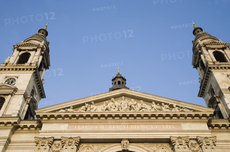 Budapest, Pest County, Hungary. Part view of Saint Stephens Basilica exterior facade. Hungary Hungarian Europe European East Eastern Buda Pest Budapest City Religion Religious Christian Architecture Facade St Saint Stephen Stephens Basilica Blue Sky Destination Destinations Eastern Europe Religion Religious Christianity Christians