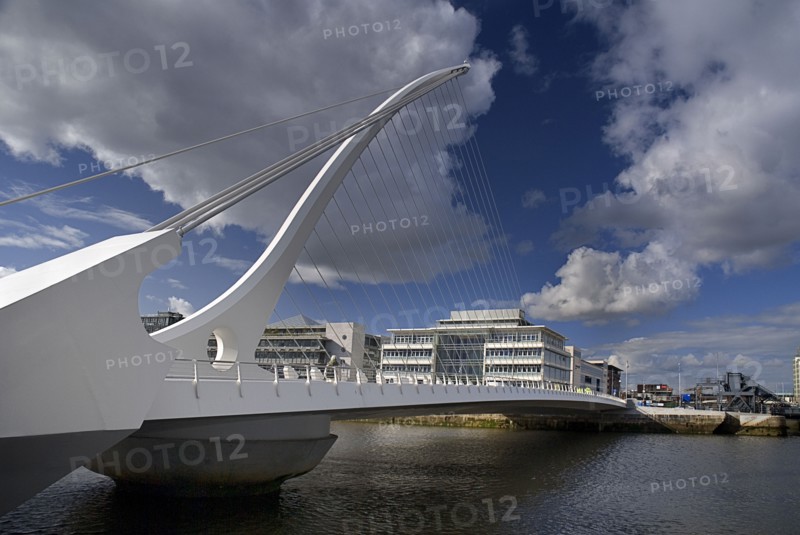 Dublin City, County Dublin, Ireland. Samuel Beckett Bridge over the River Liffey designed by Santiago Calatrava and opened on 10th December 2009. Ireland Irish Eire Erin Europe European County City Urban Dublin Baile Atha Cliath Transport Transportation Bridge River Liffey Samuel Beckett River Water Liffey Capital Blue Clouds Cloud Sky Color Northern Europe Poblacht na hEireann Republic Colour White