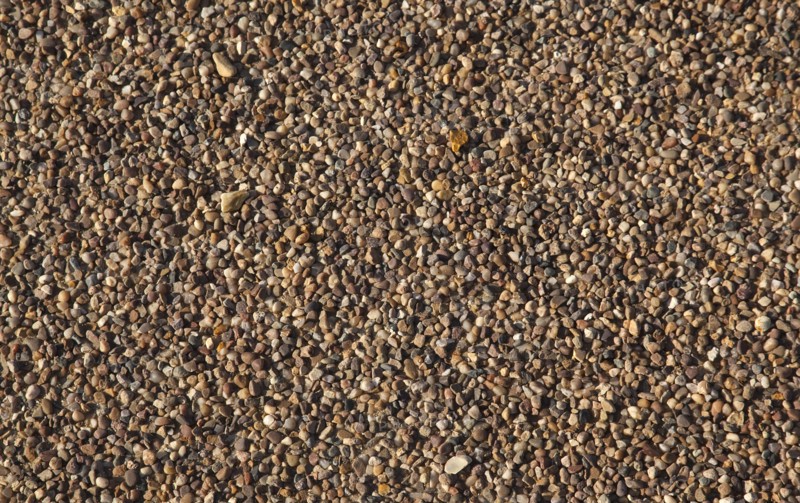 Pathway of pebbles set in cement. Background Pattern Patterns Random Stones Stone Pebble Pebbles Path Pathway Rock Rocks