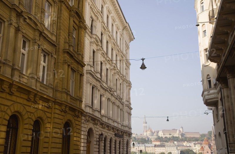 Budapest, Pest County, Hungary. Part view of apartment buildings in Pest on the banks of the River Danube framing view towards river. Hungary Hungarian Europe European East Eastern Buda Pest Budapest City Urban Architecture Apartment Flats Apartments Building Buildings Destination Destinations Eastern Europe Flat
