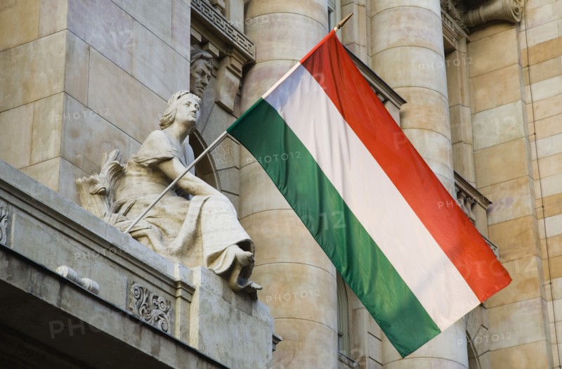 Budapest, Pest County, Hungary. Hungarian flag flying from building facade. Hungary Hungarian Europe European East Eastern Buda Pest Budapest City Architecture Facade Details Flag Tricolor Tricolour Red White Green Destination Destinations Eastern Europe