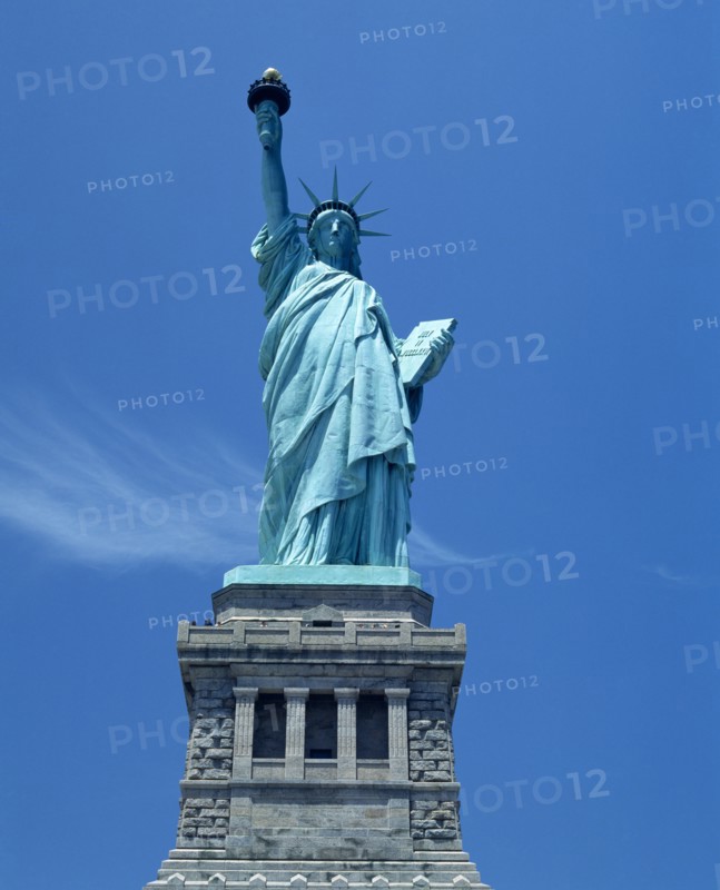 New York, New York State, USA. Statue of Liberty. Close view on plinth torch with gold flame American Blue Color Destination Destinations North America Northern United States of America