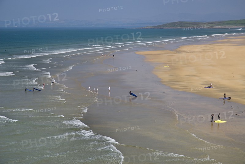 Bundoran, County Donegal, Ireland. Tullan Strand beach with surfers. Ireland Irish Eire Erin Europe European Republic County Donegal Bundorna Tullan Strand Beach Surf Surfers Shore Shoreline Sand Scenery Landscape Tourism Sea Atlantic Water Physical Geography Surfing Days out Summer Seascapes Blue Destination Destinations Holidaymakers Northern Europe Poblacht na hEireann Sand Sandy Beaches Tourism Seaside Shore Tourist Tourists Vacation Scenic Sunbather Surfer Waves Sport Watersport Breaking Breakers Surfboarding Surfers Surfer Waves Sport Watersport Breaking Breakers Surfboarding Surfing Surfer Waves Sport Watersport Breaking Breakers Surfboarding Travel Water Sand Sandy Beach Tourism Seaside Shore Tourist Tourists Vacation Sightseeing Sunbathers Surfers Waves Sport Watersport Breaking Breakers Surfboarding