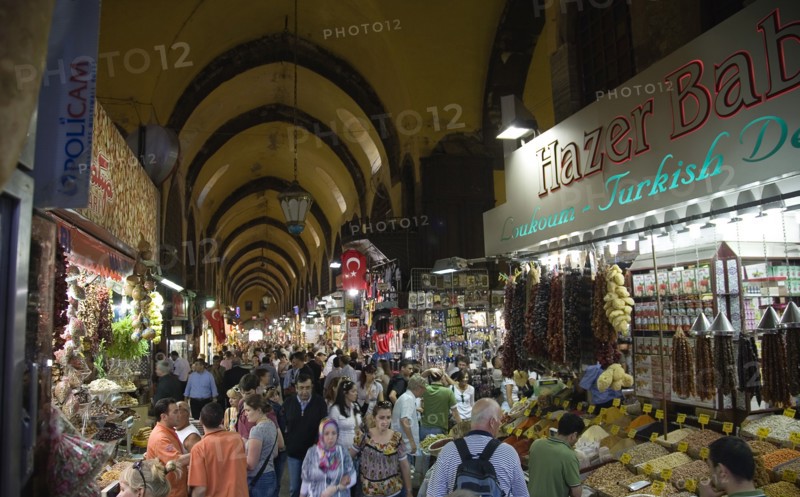 Istanbul, Turkey. Sultanahmet. The Spice Bazaar or Egyptian Bazaar one of the oldest bazaars in the city and the second largest covered shopping complex after the Grand Bazaar. Turkey Turkish Istanbul Constantinople Stamboul Stambul City Europe European Asia Asian East West Urban Destination Travel Tourism Sultanahmet Spice Bazaar Market Shop Store Stall Interior Crowd Crowded Shoppers Tourists 1 Destination Destinations Holidaymakers Middle East Shops Shoppers Mall Retail Buy Buying Market Markets Single unitary South Eastern Europe Turkiye Western Asia