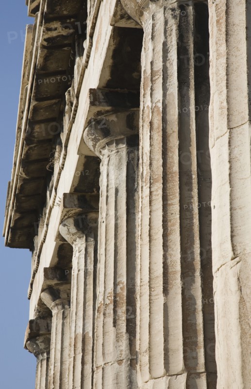 Athens, Attica, Greece. Part view of columns along eastern face of the Temple of Hephaestus. Greece Greek Attica Athens Temple Hephaestus Tourist Europe European Vacation Holiday Holidays Travel Destination Tourism Ellas Hellenic Ancient Ruin Ruins Column Columns Atenas Athenes Destination Destinations Ellada History Historic Sightseeing Southern Europe Tourists