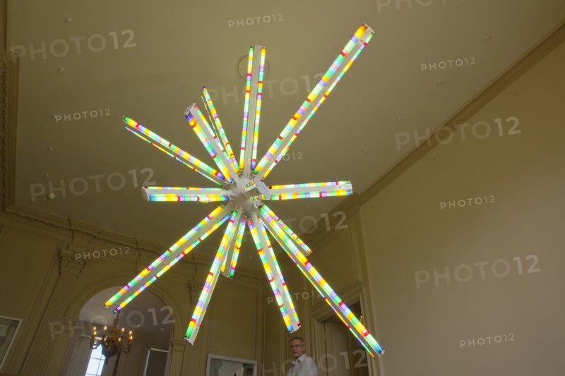 Chichester, West Sussex, England. Pallant House Art Gallery Evening Star by Spencer Finch light sculpture made from multi coloured fluorescent lighting tubes. England English UK United Kingdom GB Great Britain British West Sussex County Chichester Pallant House Art Arts Gallery Architecture Interior Lights Lighting Sculpture Chandelier Fluorescent Tube Strip Spencer Finch