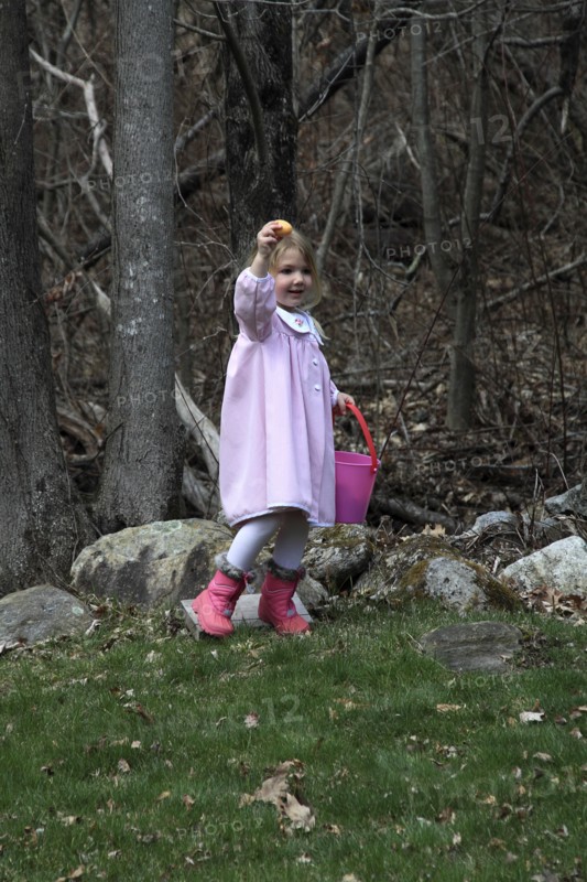 Young girl Sarah Bleau taking part in Easter egg hunt in Keene New Hampshire. Festival Festivals Religion Religious Christian Christianity Easter Egg Eggs Hunt Hunting Young Girl Sarah Bleau MR Model Release Released Model Keene NH New Hampshire USA United States State America American Immature Kids New Hampshire Live Free or Die Granite State North America Northern One individual Solo Lone Solitary Religion Religious Christianity Christians United States of America