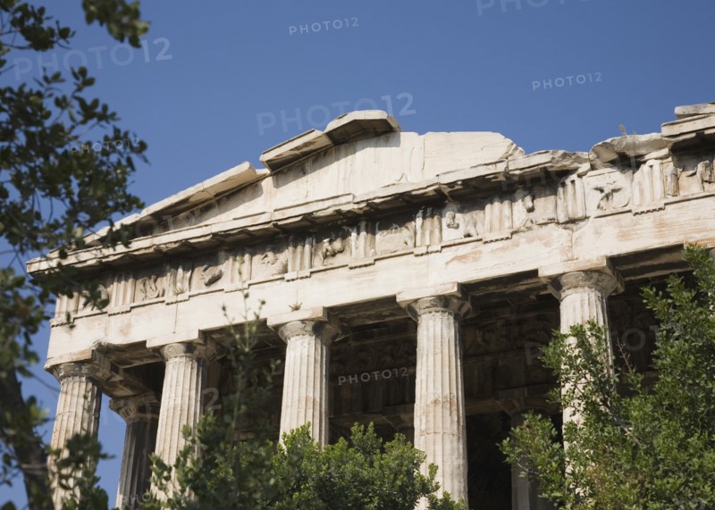 Athens, Attica, Greece. Part view of ruined portico and columns of eastern face of the Temple of Hephaestus. Greece Greek Attica Athens Temple Hephaestus Tourist Europe European Vacation Holiday Holidays Travel Destination Tourism Ellas Hellenic Ancient Ruin Ruins Column Columns Portico Blue Sky Atenas Athenes Destination Destinations Ellada History Historic Sightseeing Southern Europe Tourists
