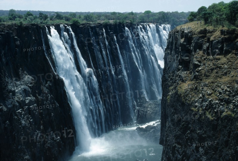 Victoria Falls, Zimbabwe. Zambezi River plunging into gorge. African Eastern Africa Scenic Zimbabwean