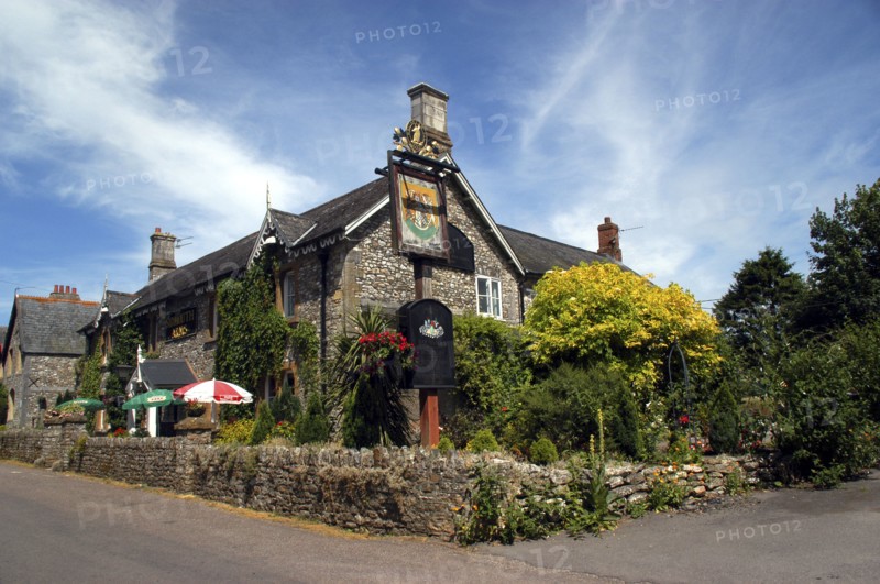 England, Devon, Upottery, Public House exterior with walled beer garden