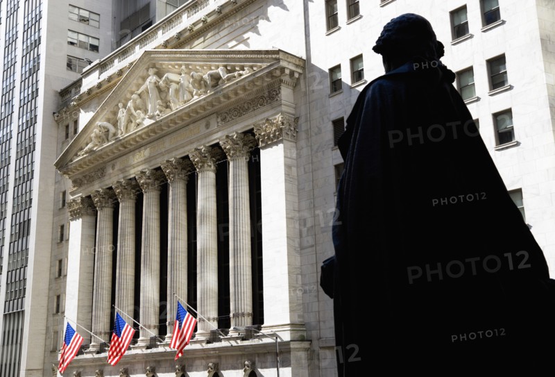 USA, New York, New York City, Manhattan  The New York Stock Exchange building in Broad Street beside Wall Street showing the main facade of the building featuring marble sculpture by John Quincy Adams Ward in the pediment called Integrity Protecting the W