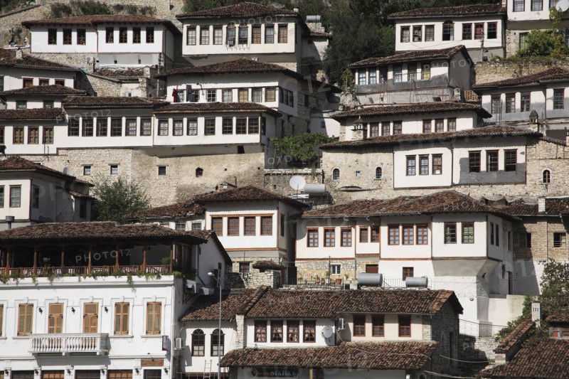 Albania, Berat, Traditional Ottoman buildings on hillside in old town.