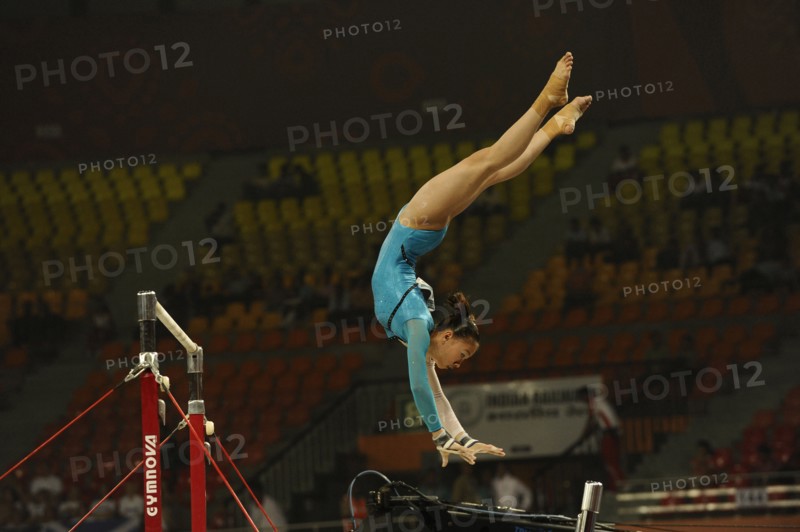 India, Delhi, 2010 Commonwealth Games  Female gymnastics  Asymmetrical bars exercise.