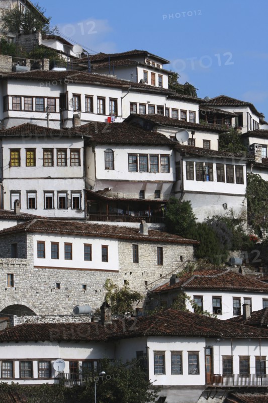 Albania, Berat, Ottoman houses in the old town with white painted exteriors and tiled roof tops