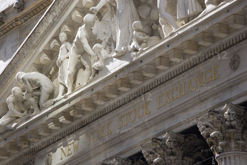 USA, New York, New York City, Manhattan  The New York Stock Exchange building in Broad Street beside Wall Street showing the main facade of the building featuring marble sculpture by John Quincy Adams Ward in the pediment called Integrity Protecting the W