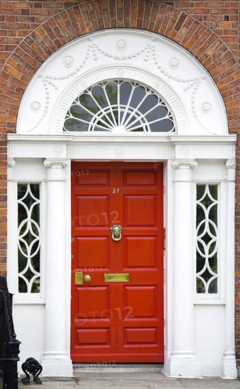 Ireland, County Dublin, Dublin City, Red Georgian door in the city centre south of the Liffey River.