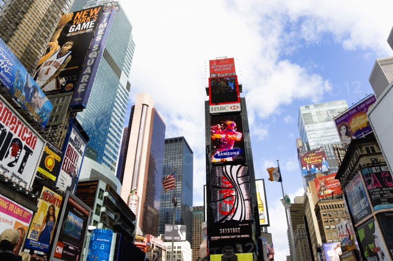 USA, New York, New York City, Manhattan  Skyscrapers in Times Square at the junction of 7th Avenue and Broadway below buildings with advertising on large video screens.