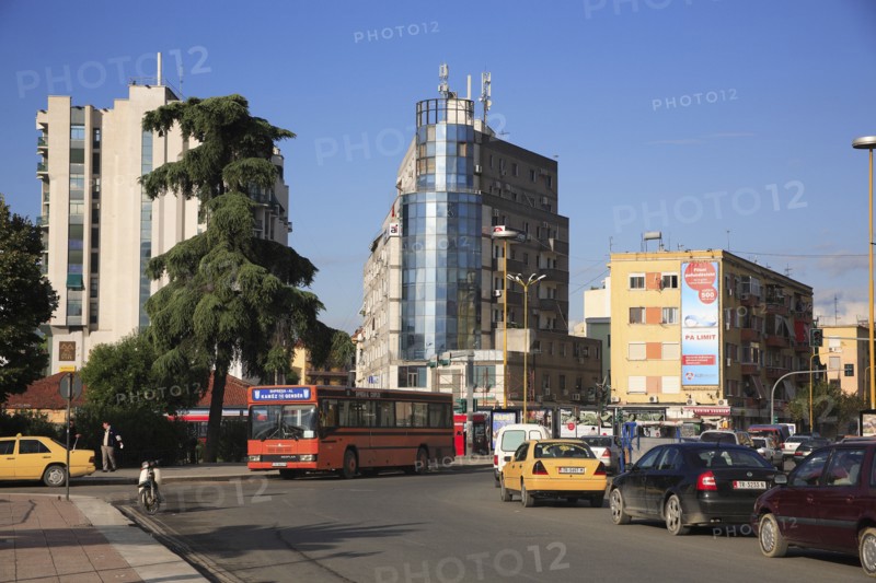 Albania, Tirane, Tirana, Busy street scene with bus in traffc.