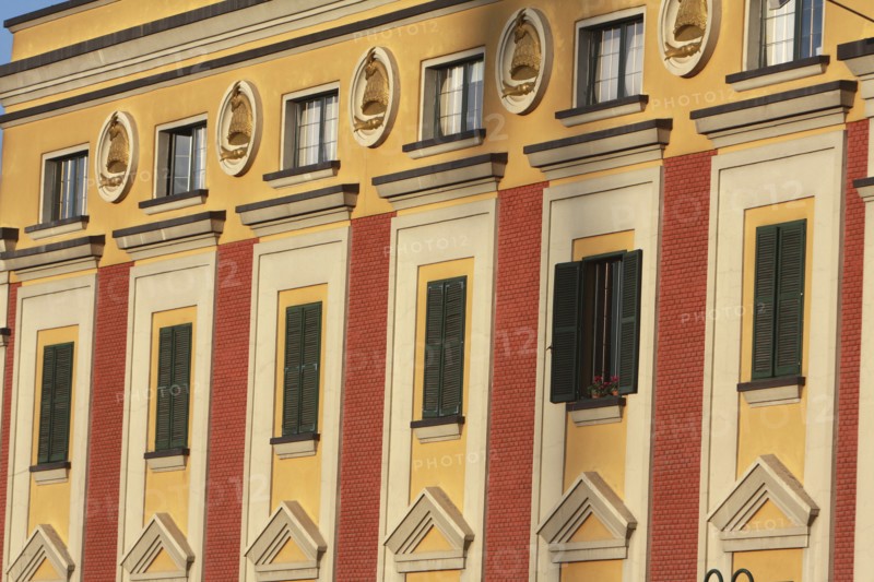 Albania, Tirane, Tirana, Detail of the facade of the government buildings on Skanderbeg Square.