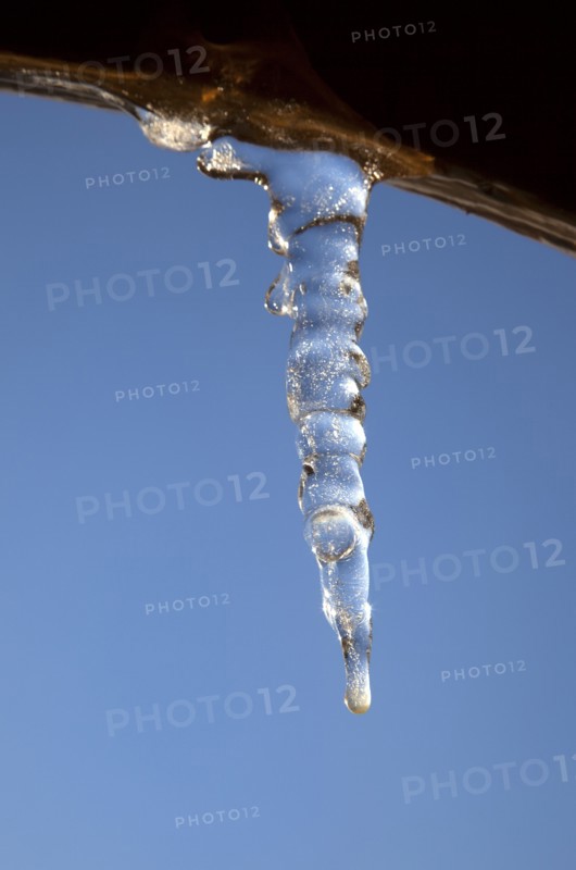 Weather, Winter, Ice, Icicles hanging from household facia panel.