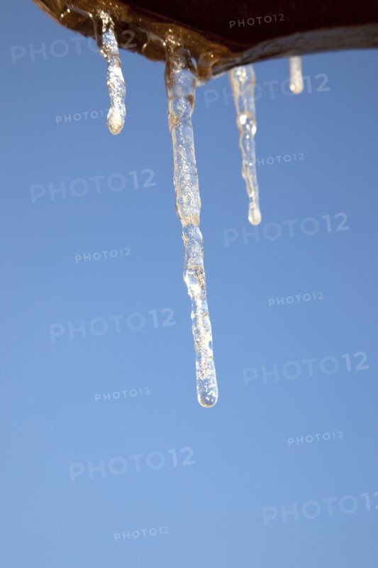 Weather, Winter, Ice, Icicles hanging from household facia panel.