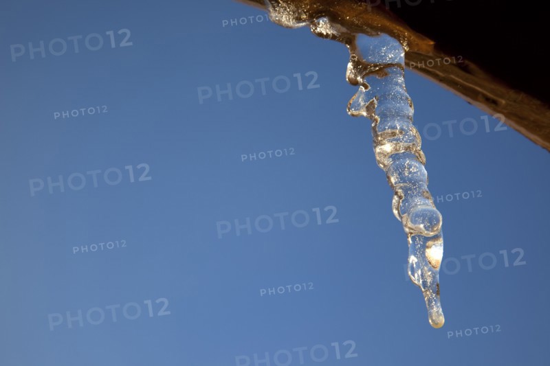 Weather, Winter, Ice, Icicles hanging from household facia panel.