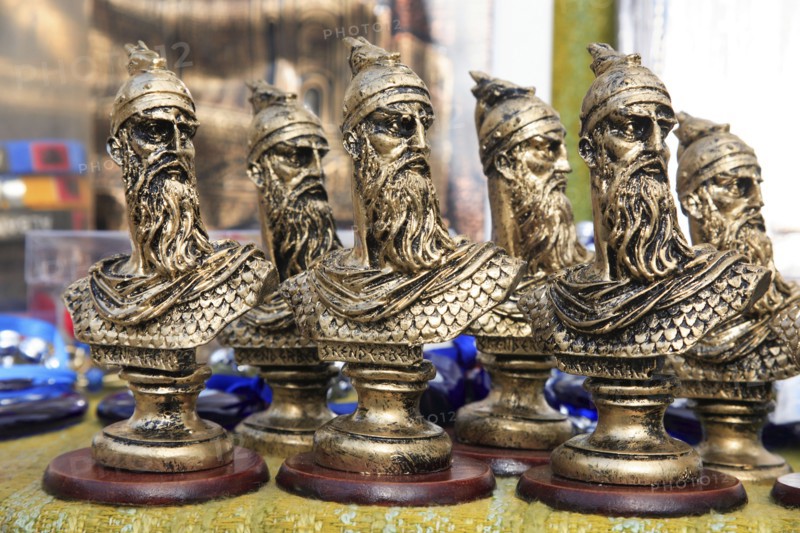 Albania, Kruja, Souvenirs displayed for sale on stalls in the market bazaar in the old town.