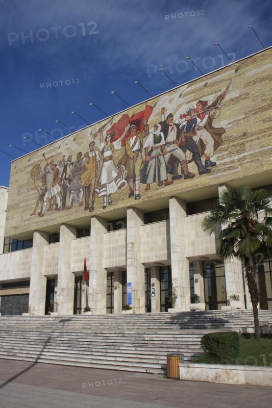 Albania, Tirane, Tirana, National History Museum. Mosaic on the exterior facade of the National History Museum in Skanderbeg Square representing the development of Albanias history.