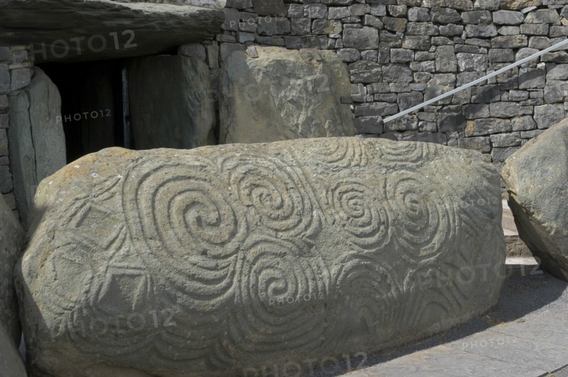 Ireland, Meath, Newgrange, Carved kerb stone outside the entrance to the historical burial site that dates from 3200BC