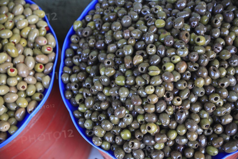 Albania, Tirane, Tirana, Bowls of olives displayed for sale in the Avni Rustemi Market.