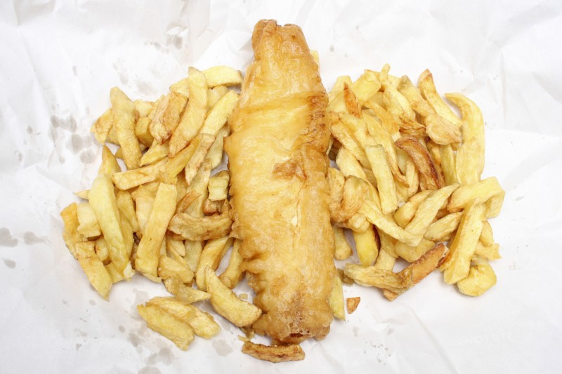 Food, Fast Food, Fish and Chips, Deep fried battered cod and chips from Fish and Chip shop  still in their paper wrapping.