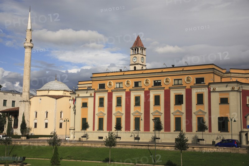 Albania, Tirane, Tirana, Government buildings and Ethem Bey mosque and minaret exterior in Skanderbeg Square.