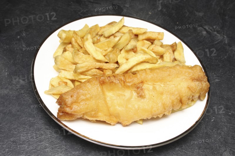Food, Fast Food, Fish and Chips, Portion of deep fried chips and battered cod from Fish and Chip shop on plate.