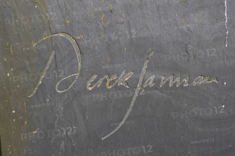 England, Kent, Romney Marshes, Old Romney  Detail of Derek Jarmans modern headstone the graveyard of St Clements church.