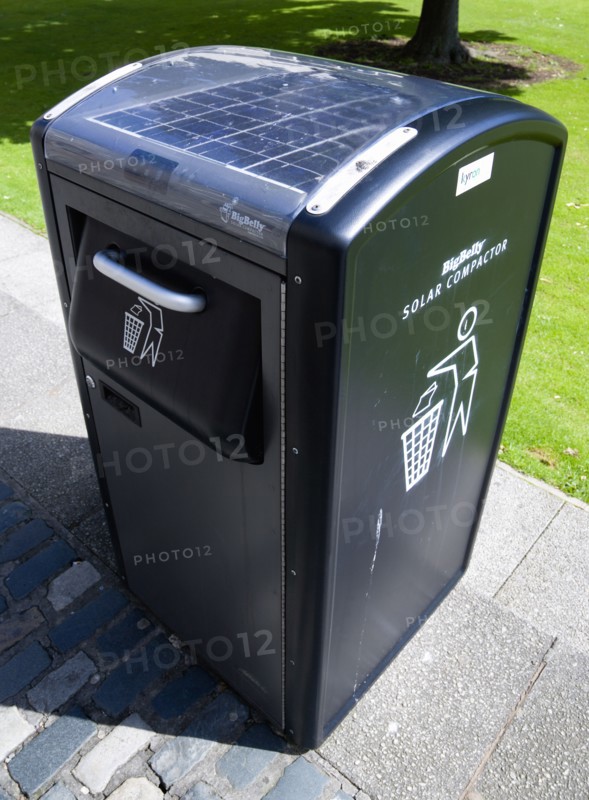 Ireland, County Dublin, Dublin City, Solar powered rubbish compactor on the campus of Trinity College university.