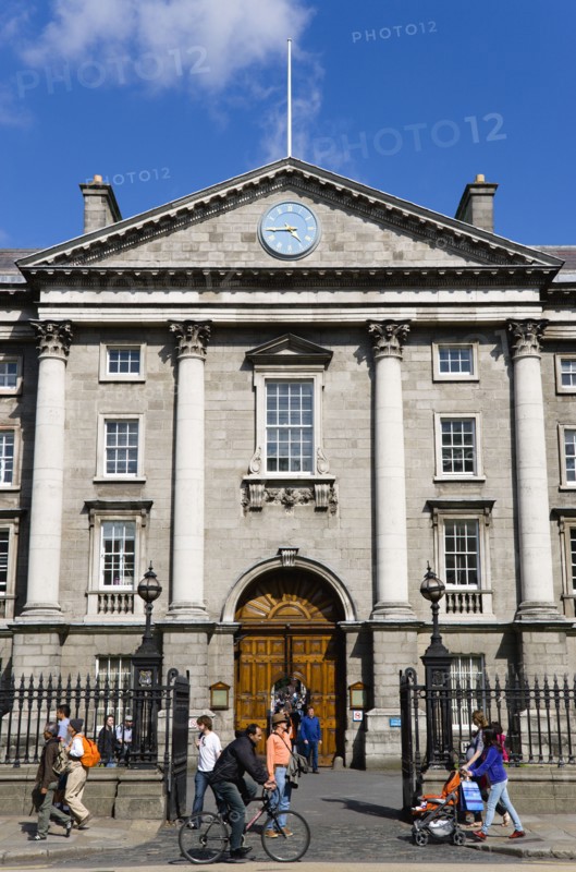 Ireland, County Dublin, Dublin City, The Front Gate and entrance through Regent House of Trinity College university campus with sightseeing tourists.