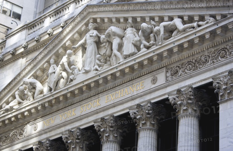 USA, New York, New York City, Manhattan  The New York Stock Exchange building in Broad Street beside Wall Street showing the main facade of the building featuring marble sculpture by John Quincy Adams Ward in the pediment called Integrity Protecting the W