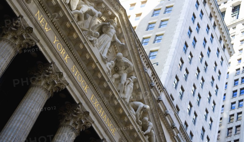 USA, New York, New York City, Manhattan  The New York Stock Exchange building in Broad Street beside Wall Street showing the main facade of the building featuring marble sculpture by John Quincy Adams Ward in the pediment called Integrity Protecting the W