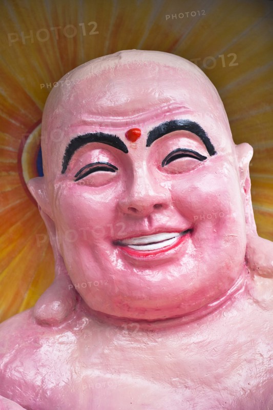 Colourful pink Buddha in Guan Yin Temple near Dali. Photo: Mel Longhurst