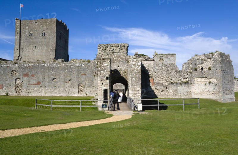Portchester Castle showing the Norman 12th Century Tower and 14th Century Keep beyond the bridge over the moat built within the Roman 3rd Century Saxon Shore Fort. Photo : Paul Seheult