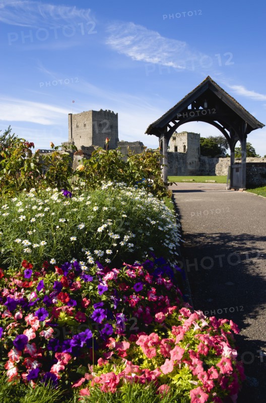 Portchester Castle. The 12th Century Norman tower and 14th Century Keep in the old Roman 3rd Century Saxon Shore Fort seen from the grounds of the Norman Ausgustine Priory garden. Photo : Paul Seheult